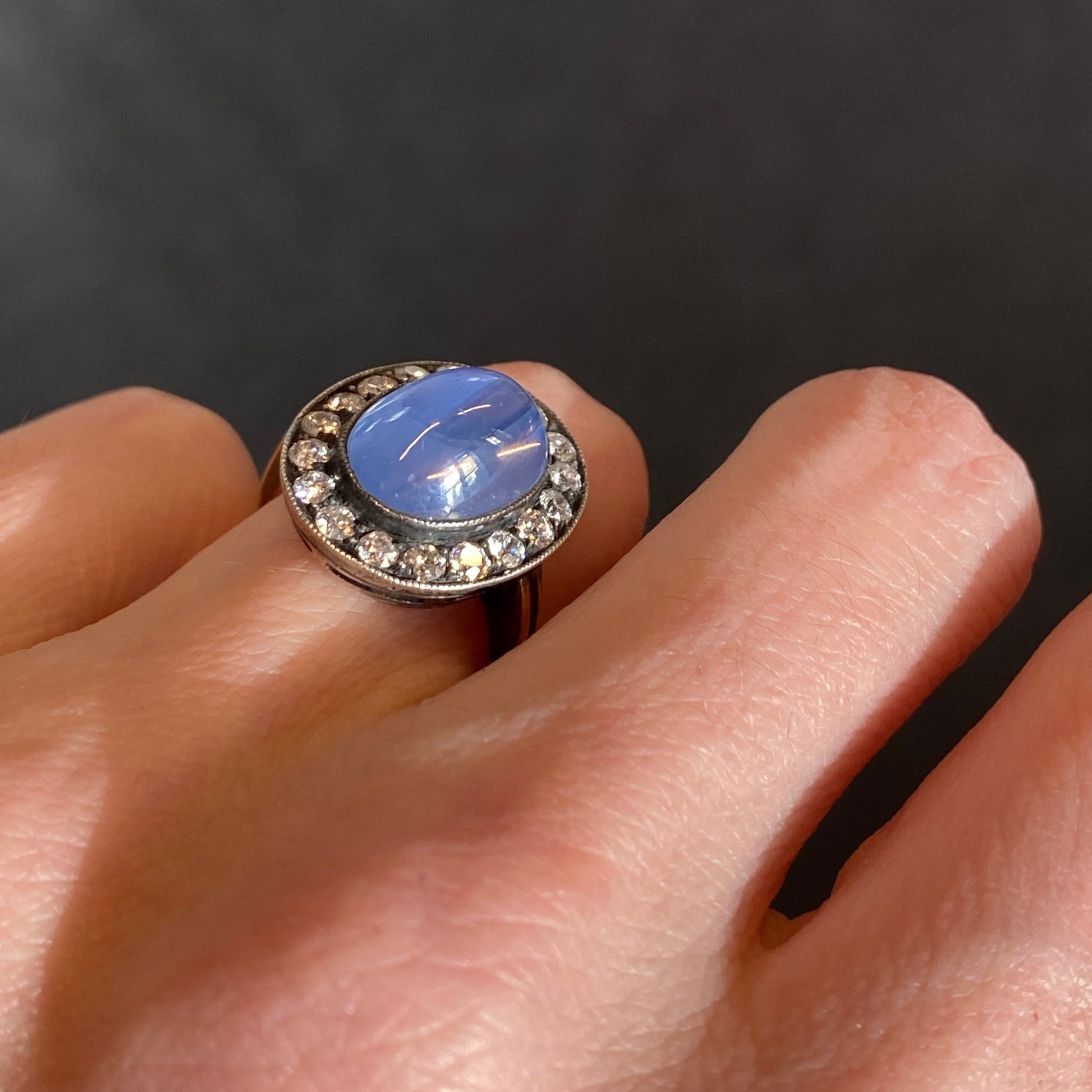 Antique No Heat Cabochon Blue Sapphire and Diamond Halo Ring 