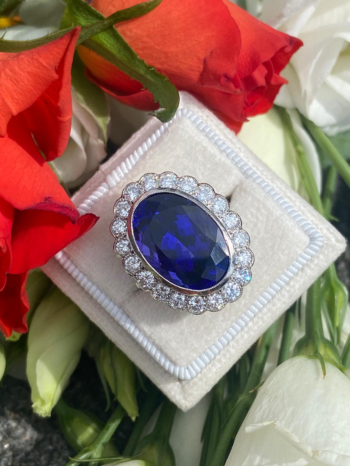 10 Carat Oval Tanzanite and Diamond Halo Cocktail Ring in Platinum